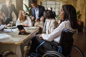 Black disabled woman in a wheelchair